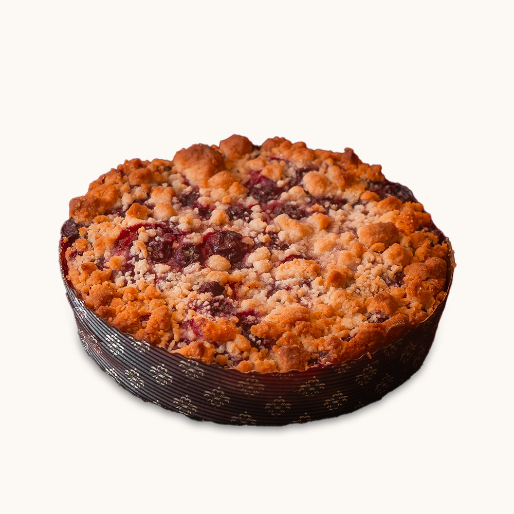 Altdeutscher Obstkuchen mit Streuseln in runder Backform</p>
<p>